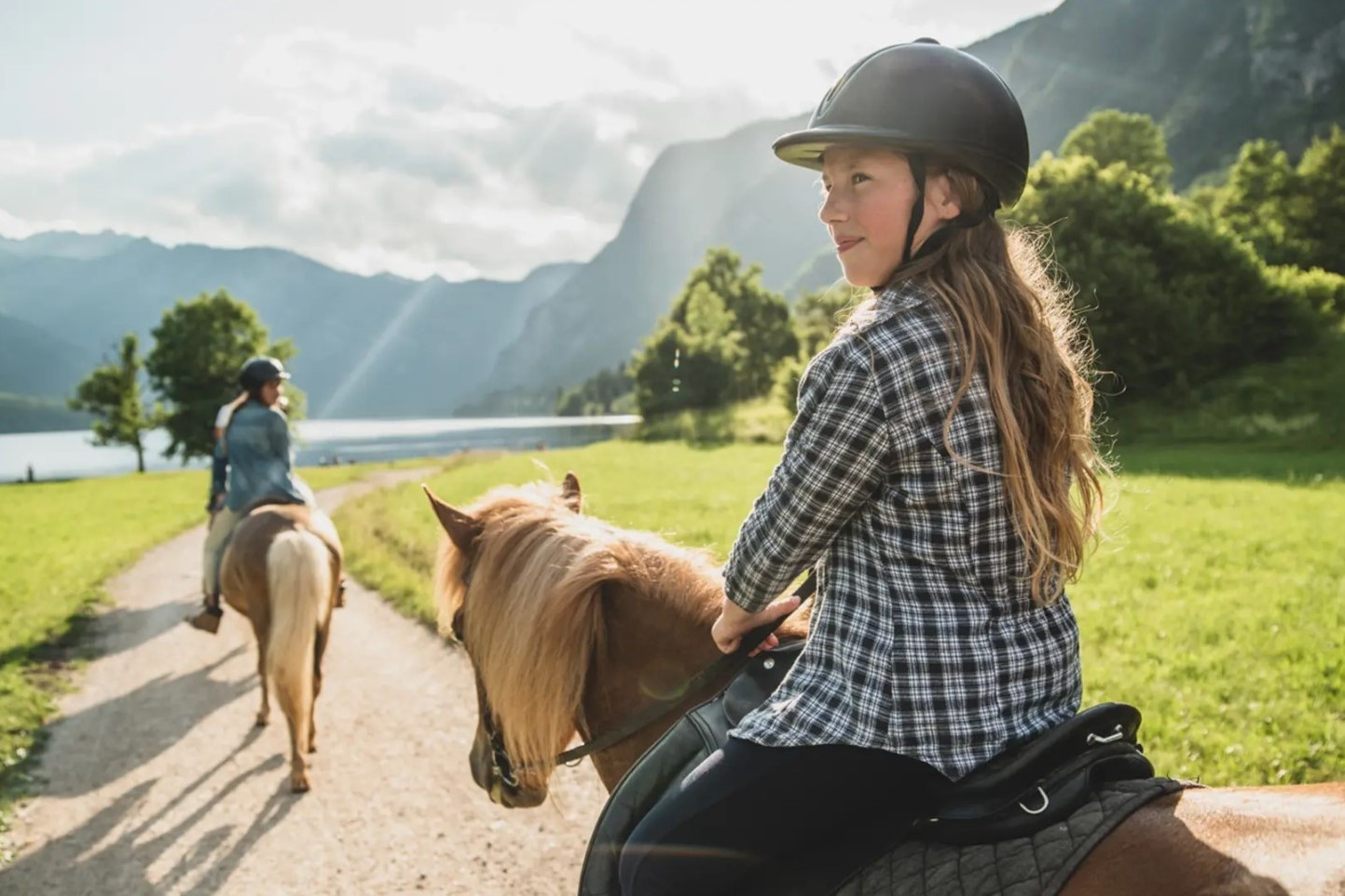 Zakaj je jahanje konj dobro za vas, še boljše pa za vaše otroke